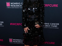 NJ Falk arrives at The Women's Cancer Research Fund's An Unforgettable Evening Benefit Gala 2023 held at the Beverly Wilshire, A Four Season...