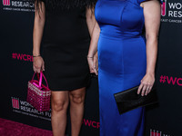 Ramona Agruma and girlfriend/Australian actress Rebel Wilson arrive at The Women's Cancer Research Fund's An Unforgettable Evening Benefit G...