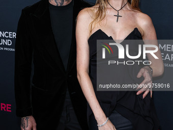 American singer and songwriter Adam Levine of American pop rock band Maroon 5 and wife/Namibian model Behati Prinsloo arrive at The Women's...