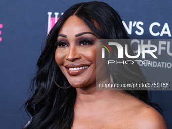 American model, reality television personality and actress Cynthia Bailey arrives at The Women's Cancer Research Fund's An Unforgettable Eve...