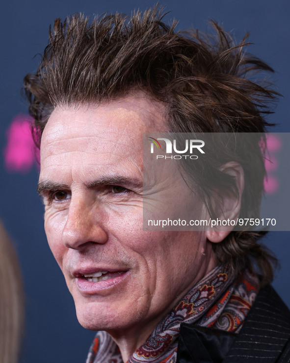 British musician John Taylor of English rock band Duran Duran arrives at The Women's Cancer Research Fund's An Unforgettable Evening Benefit...