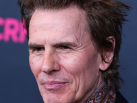 British musician John Taylor of English rock band Duran Duran arrives at The Women's Cancer Research Fund's An Unforgettable Evening Benefit...