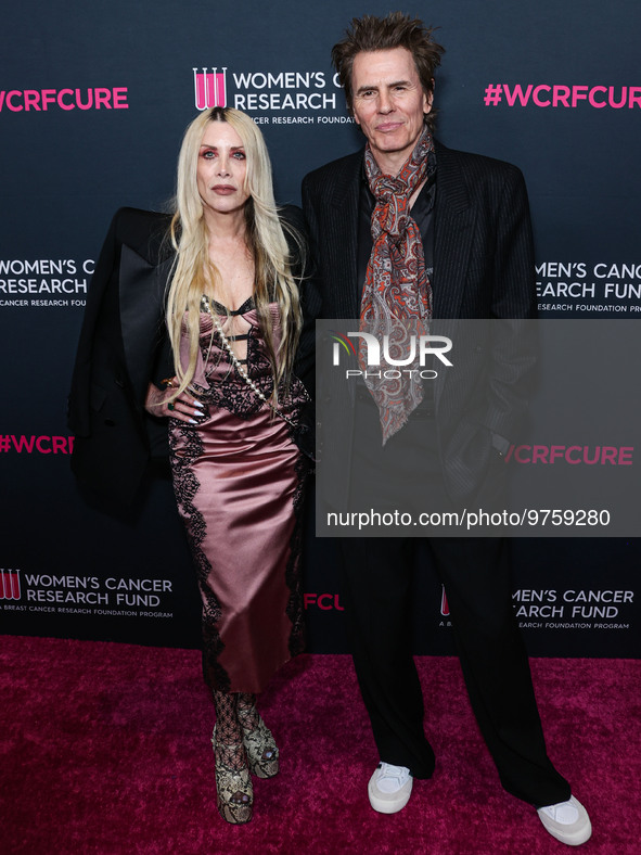 Gela Nash-Taylor and husband/British musician John Taylor of English rock band Duran Duran arrive at The Women's Cancer Research Fund's An U...