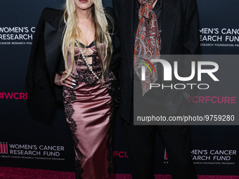 Gela Nash-Taylor and husband/British musician John Taylor of English rock band Duran Duran arrive at The Women's Cancer Research Fund's An U...