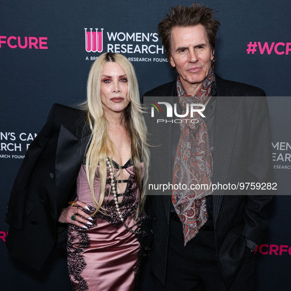 Gela Nash-Taylor and husband/British musician John Taylor of English rock band Duran Duran arrive at The Women's Cancer Research Fund's An U...