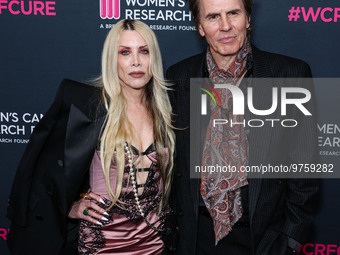 Gela Nash-Taylor and husband/British musician John Taylor of English rock band Duran Duran arrive at The Women's Cancer Research Fund's An U...