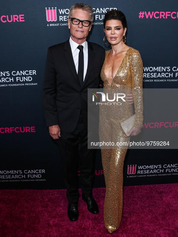 American actor, author and entrepreneur Harry Hamlin and wife/American actress, television personality and model Lisa Rinna arrive at The Wo...