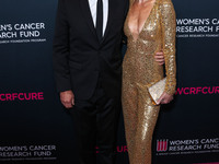 American actor, author and entrepreneur Harry Hamlin and wife/American actress, television personality and model Lisa Rinna arrive at The Wo...