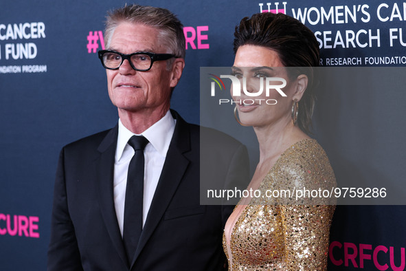 American actor, author and entrepreneur Harry Hamlin and wife/American actress, television personality and model Lisa Rinna arrive at The Wo...