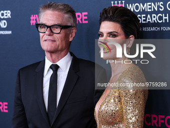 American actor, author and entrepreneur Harry Hamlin and wife/American actress, television personality and model Lisa Rinna arrive at The Wo...