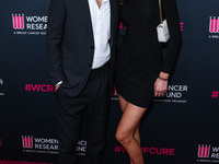 American actor, director and producer Paul Wesley and Natalie Kuckenburg arrive at The Women's Cancer Research Fund's An Unforgettable Eveni...