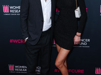 American actor, director and producer Paul Wesley and Natalie Kuckenburg arrive at The Women's Cancer Research Fund's An Unforgettable Eveni...