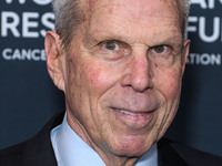 American film producer and businessman Steve Tisch arrives at The Women's Cancer Research Fund's An Unforgettable Evening Benefit Gala 2023...