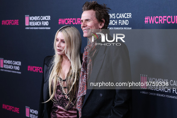 Gela Nash-Taylor and husband/British musician John Taylor of English rock band Duran Duran arrive at The Women's Cancer Research Fund's An U...