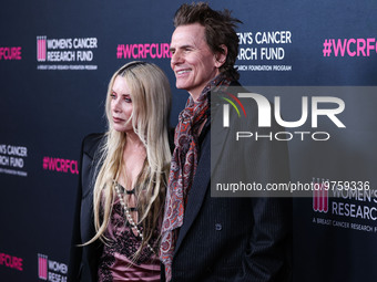 Gela Nash-Taylor and husband/British musician John Taylor of English rock band Duran Duran arrive at The Women's Cancer Research Fund's An U...