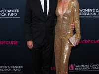 American actor, author and entrepreneur Harry Hamlin and wife/American actress, television personality and model Lisa Rinna arrive at The Wo...