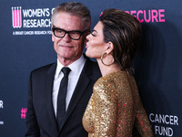 American actor, author and entrepreneur Harry Hamlin and wife/American actress, television personality and model Lisa Rinna arrive at The Wo...