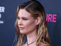 Namibian model Behati Prinsloo arrives at The Women's Cancer Research Fund's An Unforgettable Evening Benefit Gala 2023 held at the Beverly...