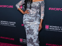 American model, reality television personality and actress Cynthia Bailey arrives at The Women's Cancer Research Fund's An Unforgettable Eve...