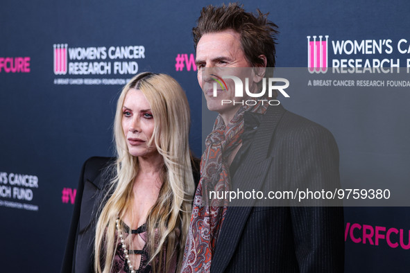 Gela Nash-Taylor and husband/British musician John Taylor of English rock band Duran Duran arrive at The Women's Cancer Research Fund's An U...