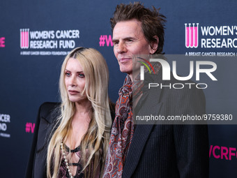 Gela Nash-Taylor and husband/British musician John Taylor of English rock band Duran Duran arrive at The Women's Cancer Research Fund's An U...