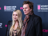 Gela Nash-Taylor and husband/British musician John Taylor of English rock band Duran Duran arrive at The Women's Cancer Research Fund's An U...