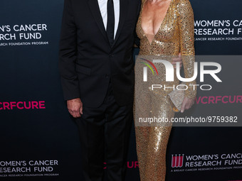 American actor, author and entrepreneur Harry Hamlin and wife/American actress, television personality and model Lisa Rinna arrive at The Wo...