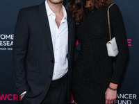 American actor, director and producer Paul Wesley and Natalie Kuckenburg arrive at The Women's Cancer Research Fund's An Unforgettable Eveni...