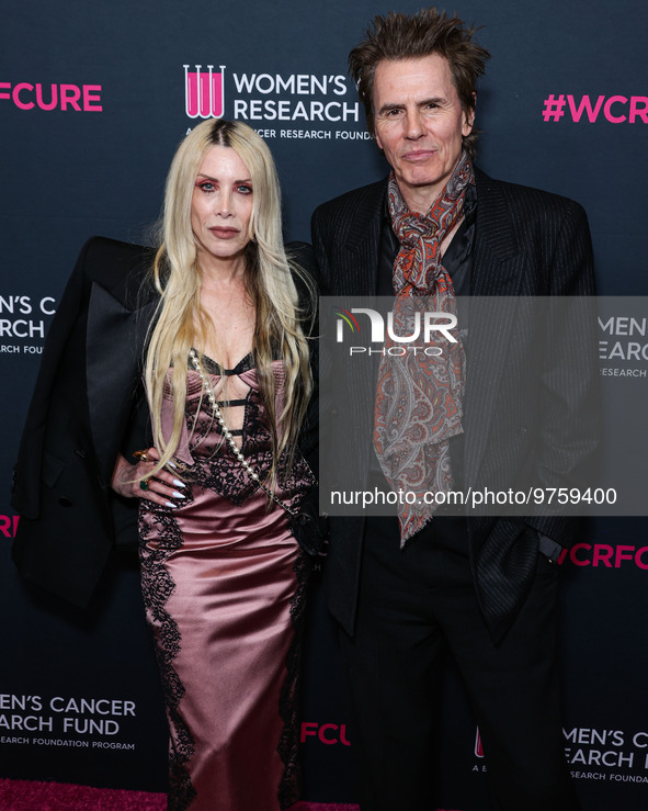 Gela Nash-Taylor and husband/British musician John Taylor of English rock band Duran Duran arrive at The Women's Cancer Research Fund's An U...