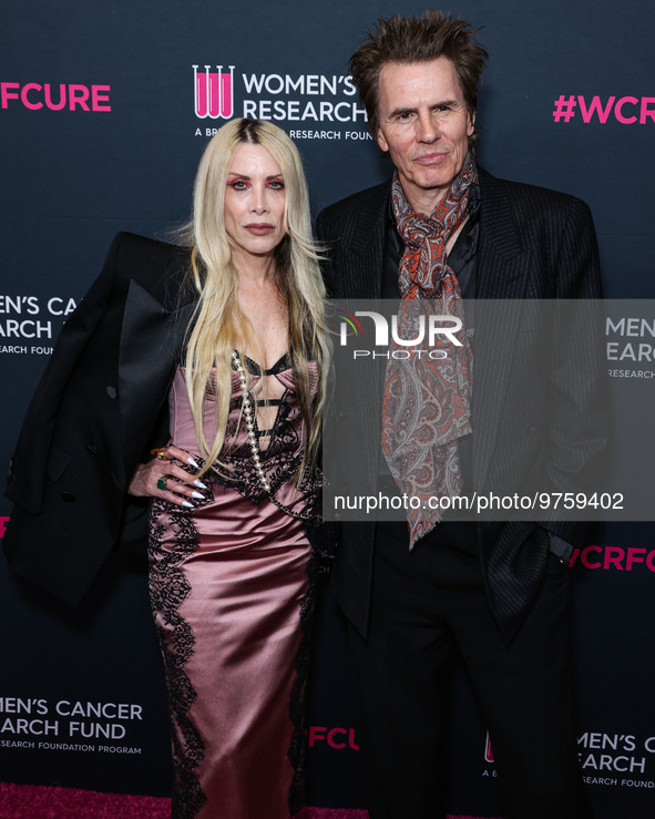 Gela Nash-Taylor and husband/British musician John Taylor of English rock band Duran Duran arrive at The Women's Cancer Research Fund's An U...