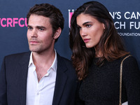 American actor, director and producer Paul Wesley and Natalie Kuckenburg arrive at The Women's Cancer Research Fund's An Unforgettable Eveni...