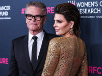 American actor, author and entrepreneur Harry Hamlin and wife/American actress, television personality and model Lisa Rinna arrive at The Wo...