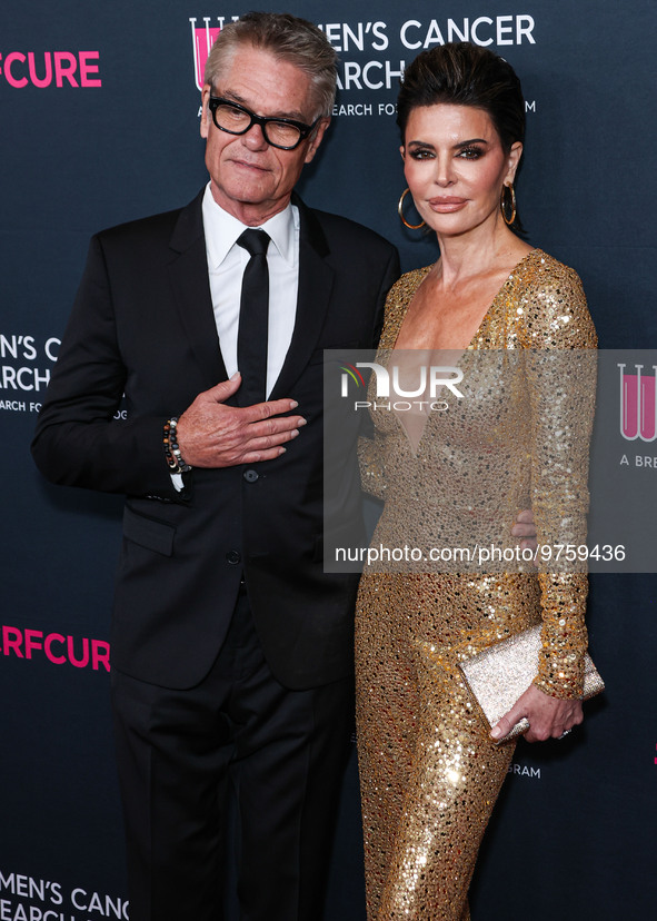 American actor, author and entrepreneur Harry Hamlin and wife/American actress, television personality and model Lisa Rinna arrive at The Wo...