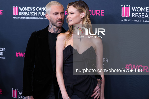 American singer and songwriter Adam Levine of American pop rock band Maroon 5 and wife/Namibian model Behati Prinsloo arrive at The Women's...