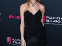 Namibian model Behati Prinsloo arrives at The Women's Cancer Research Fund's An Unforgettable Evening Benefit Gala 2023 held at the Beverly...