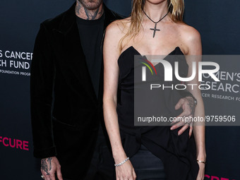 American singer and songwriter Adam Levine of American pop rock band Maroon 5 and wife/Namibian model Behati Prinsloo arrive at The Women's...