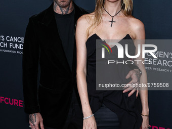 American singer and songwriter Adam Levine of American pop rock band Maroon 5 and wife/Namibian model Behati Prinsloo arrive at The Women's...