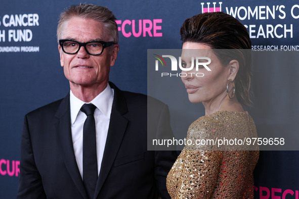 American actor, author and entrepreneur Harry Hamlin and wife/American actress, television personality and model Lisa Rinna arrive at The Wo...