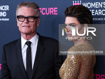 American actor, author and entrepreneur Harry Hamlin and wife/American actress, television personality and model Lisa Rinna arrive at The Wo...