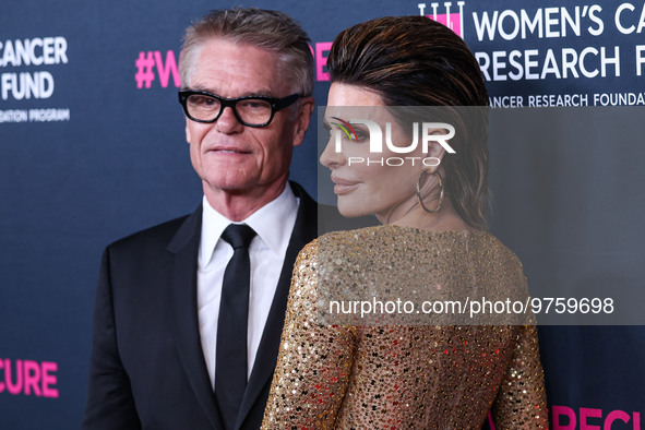 American actor, author and entrepreneur Harry Hamlin and wife/American actress, television personality and model Lisa Rinna arrive at The Wo...