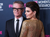 American actor, author and entrepreneur Harry Hamlin and wife/American actress, television personality and model Lisa Rinna arrive at The Wo...