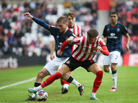 Sunderland's Dan Neil wins the ball from Luton Town's Luke Berry during the Sky Bet Championship match between Sunderland and Luton Town at...