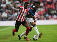 Sunderland's Abdoullah BA takes on Luton Town's Gabriel Osho during the Sky Bet Championship match between Sunderland and Luton Town at the...