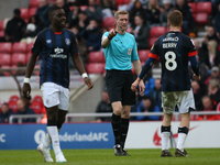 Referee Scott Oldham warns Luton Town's Luke Berry during the Sky Bet Championship match between Sunderland and Luton Town at the Stadium Of...