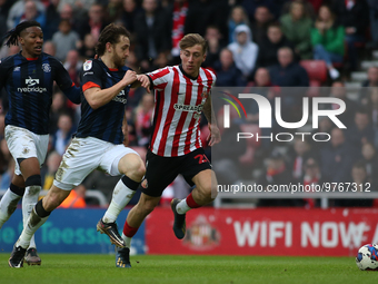 Sunderland's Jack Clarke breaks away from Luton Town's Tom Lockyer during the Sky Bet Championship match between Sunderland and Luton Town a...