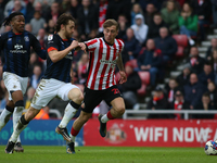 Sunderland's Jack Clarke breaks away from Luton Town's Tom Lockyer during the Sky Bet Championship match between Sunderland and Luton Town a...