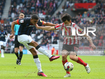 Luton Town's Cody Drameh is challenged by Sunderland's Luke O'Nien during the Sky Bet Championship match between Sunderland and Luton Town a...