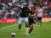 Sunderland's Edouard Michut challanges Luton Town's Cody Drameh during the Sky Bet Championship match between Sunderland and Luton Town at t...