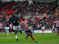 Luton Town's Fred Onyedinma chases Sunderland's Amad Diallo during the Sky Bet Championship match between Sunderland and Luton Town at the S...