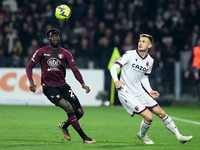 Stefan Posch of Bologna FC and Boulaye Dia of US Salernitana compete for the ball during the Serie A match between US Salernitana and Bologn...